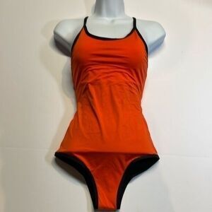 Beautikini women’s orange/black one piece bathing suit. Fully lined size XS NWT
